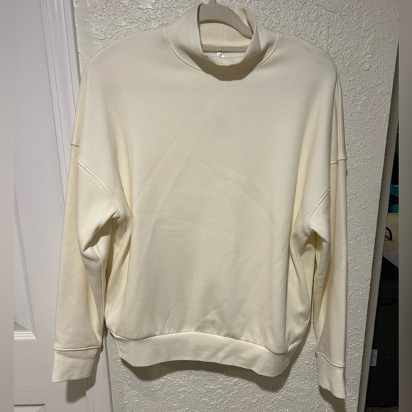 Fabletics Tops - NWT Fabletics women’s size xs off white sweatshirt with side pockets.